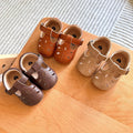 Baby T-strap shoes in several colours arranged together, second view