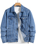 Blue denim jacket with a button front and chest flap pockets, hanging on a wooden hanger