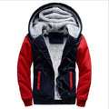 Navy hooded zip jacket with bright red sleeves, red zip pockets and a fluffy-looking lining