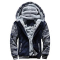 Navy hooded zip jacket with camouflage sleeves and a fluffy-looking lining in the hood
