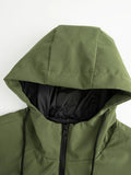 Close-up of a green jacket hood and black zip at the neck