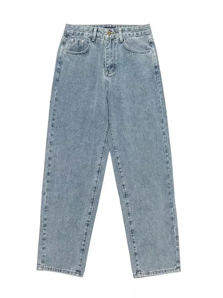 Light blue washed baggy jeans laid flat on a white background showing the straight wide leg
