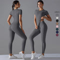 Two views of a woman in a grey short-sleeve top and matching leggings, with colour swatches beside her