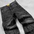 Black washed baggy wide-leg jeans with frayed thread-line texture, laid flat
