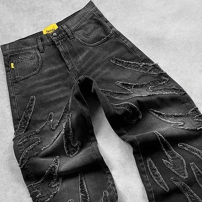 Black washed baggy wide-leg jeans with frayed thread-line texture, laid flat