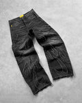 Black washed baggy wide-leg jeans with frayed thread lines and a raw hem