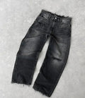 Charcoal washed baggy wide-leg jeans with a raw frayed hem laid flat